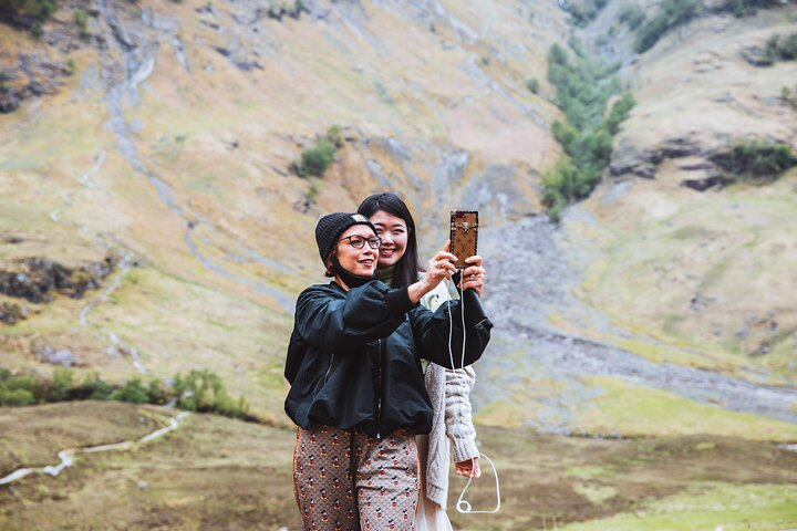 Discover stunning Highland landscapes as you capture unforgettable moments with friends. Experience the beauty of nature while exploring iconic spots making memories that last a lifetime.